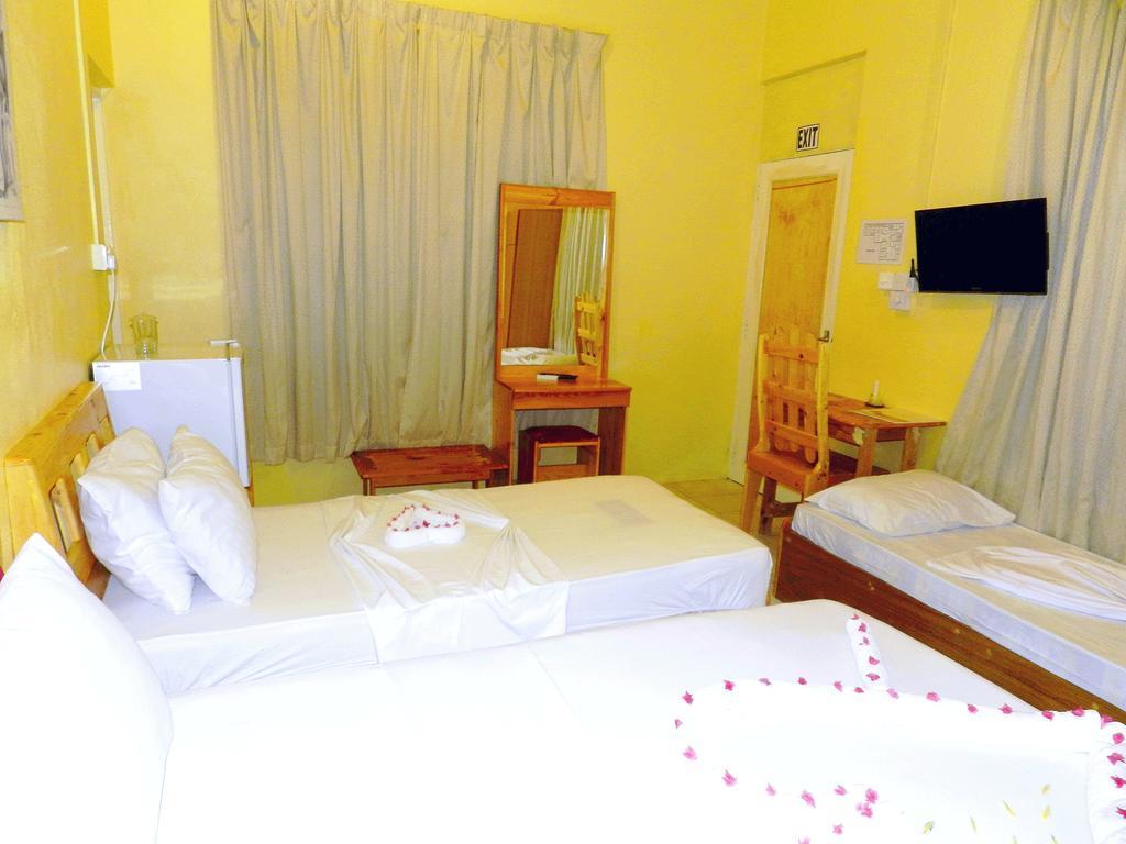 Picnic Inn Maafushi Habitación foto